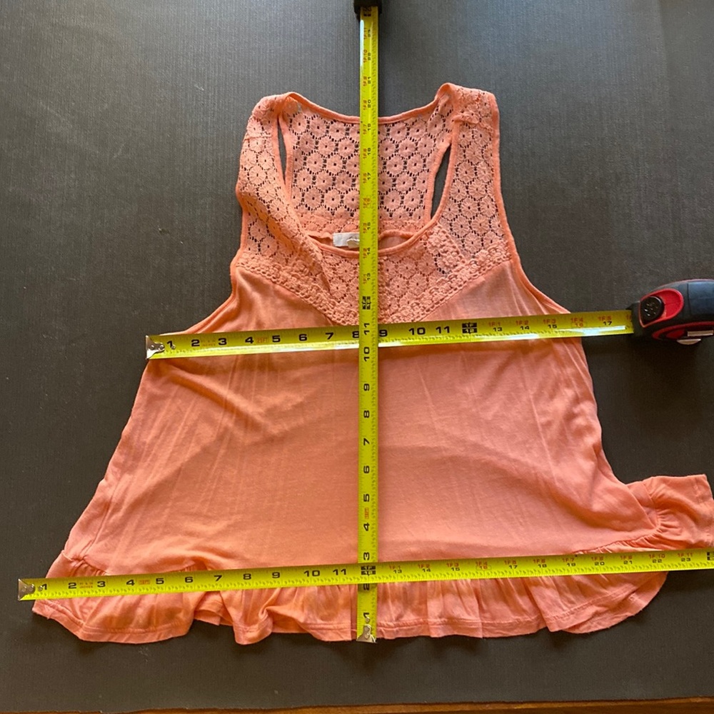 E M Peach shirt